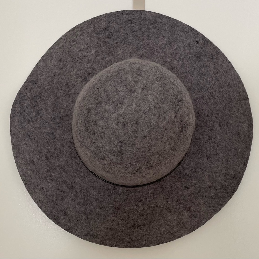 Calvin Klein 100% wool hat with black leather and metal accent. Grey.